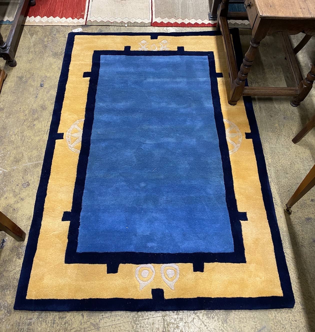A contemporary Chinese style blue ground rug, 180 x 124cm